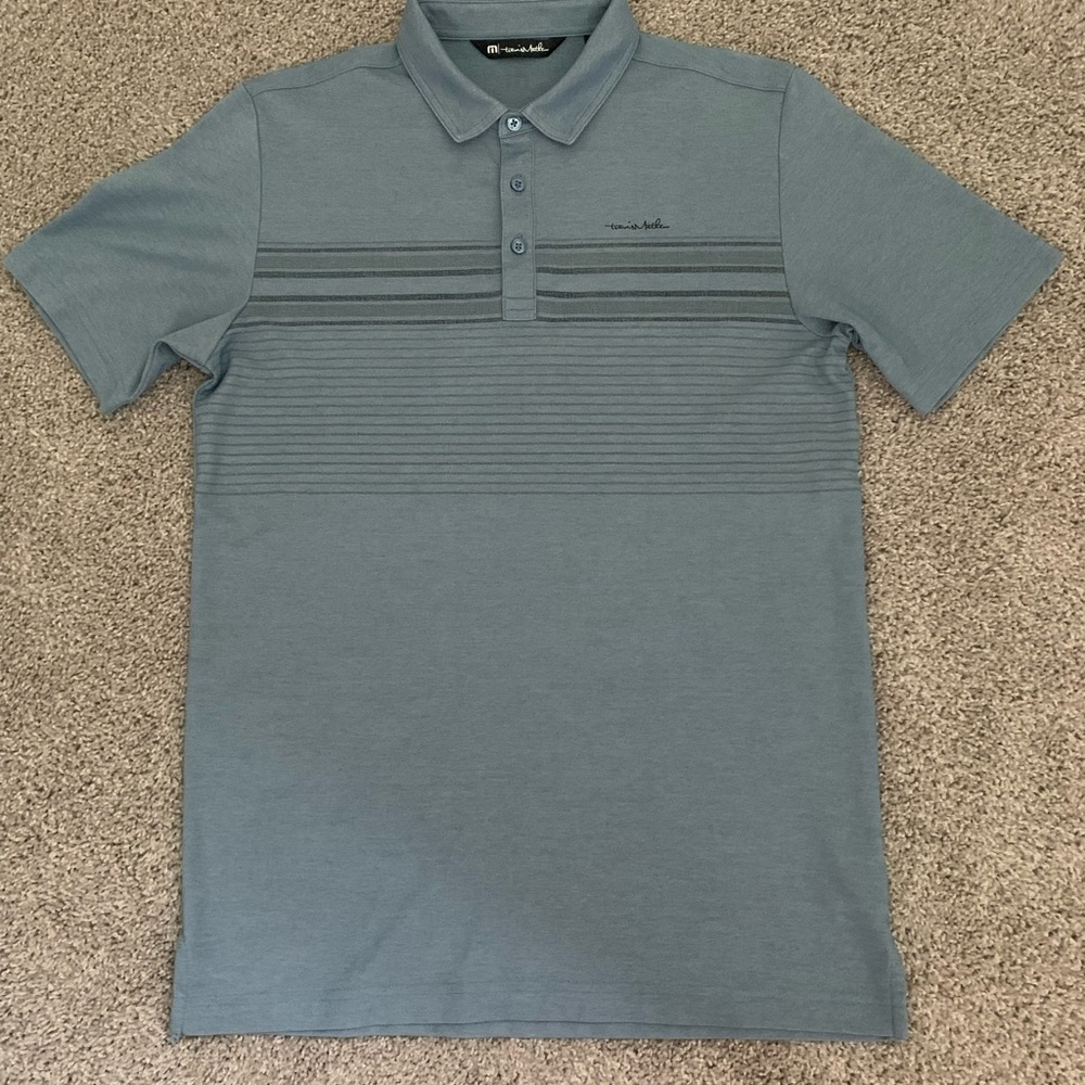 Travis Mathew Blue Polo Shirt with Subtle Stripes